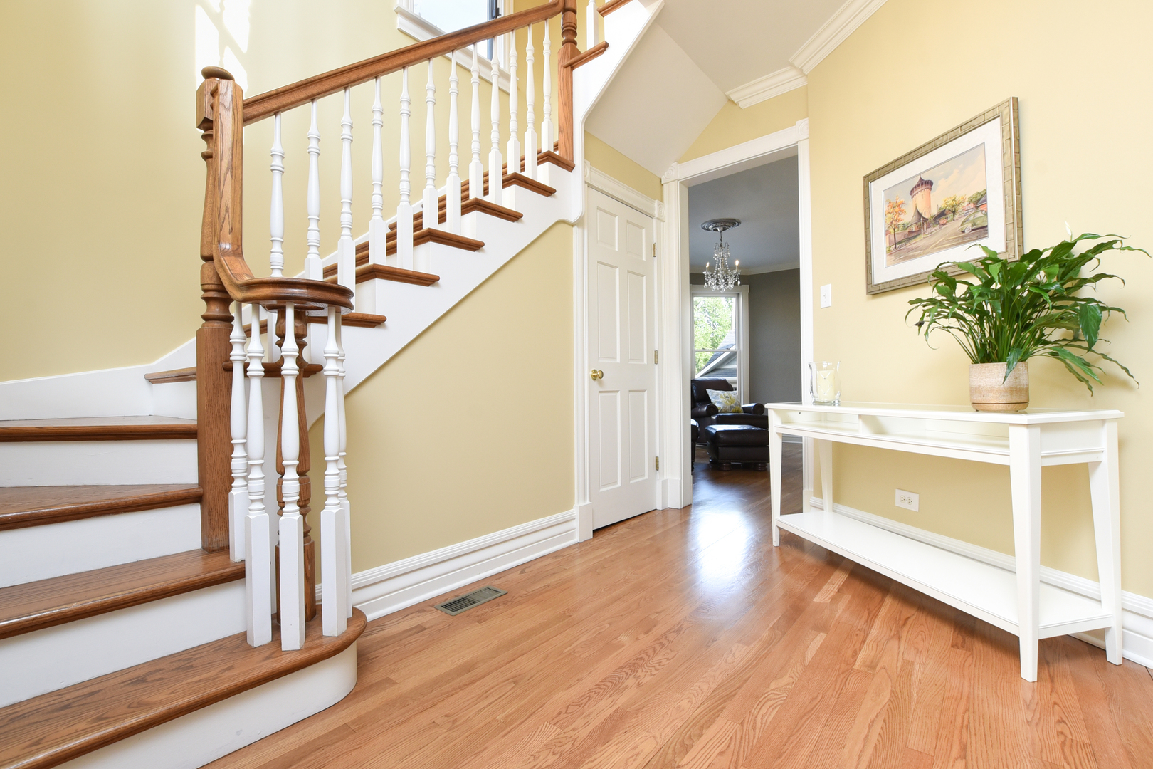 300 North Delaplaine Road Riverside, IL 60546 - Photo 5 of 50 a view of a hallway view with wooden floor and staircase
