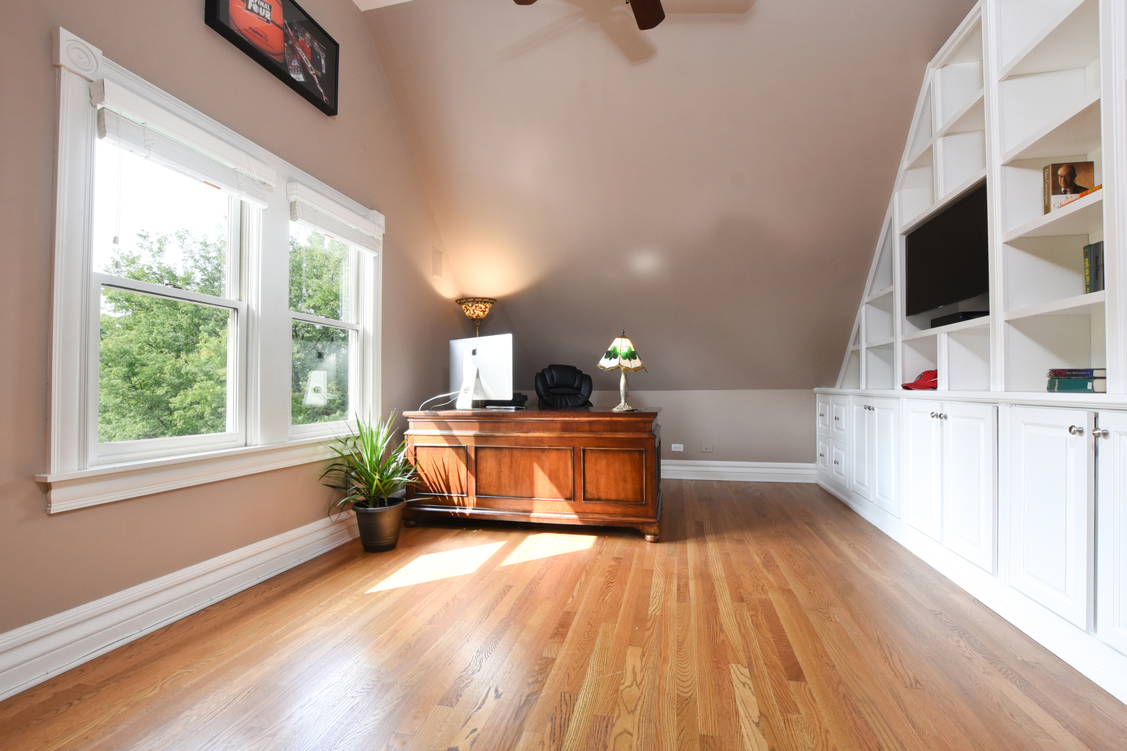 300 North Delaplaine Road Riverside, IL 60546 - Photo 42 of 50 a spacious bedroom with a bed and wooden floor
