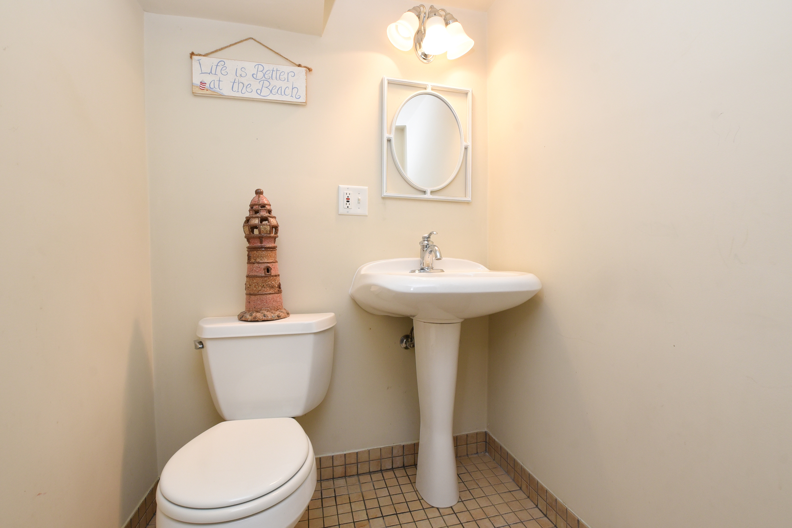 300 North Delaplaine Road Riverside, IL 60546 - Photo 45 of 50 a bathroom with a sink toilet and a mirror