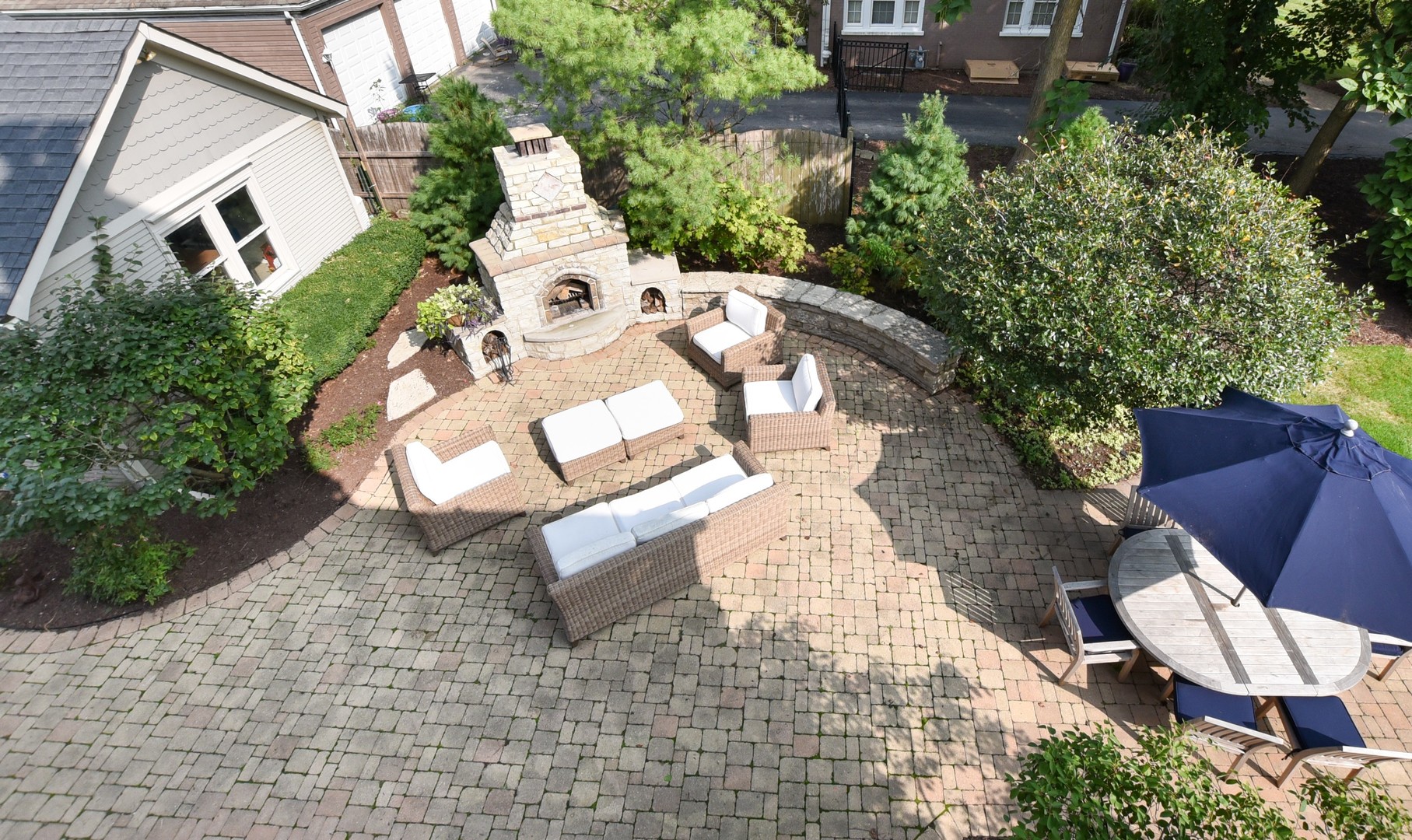 300 North Delaplaine Road Riverside, IL 60546 - Photo 46 of 50 an aerial view of a house with a yard and garden