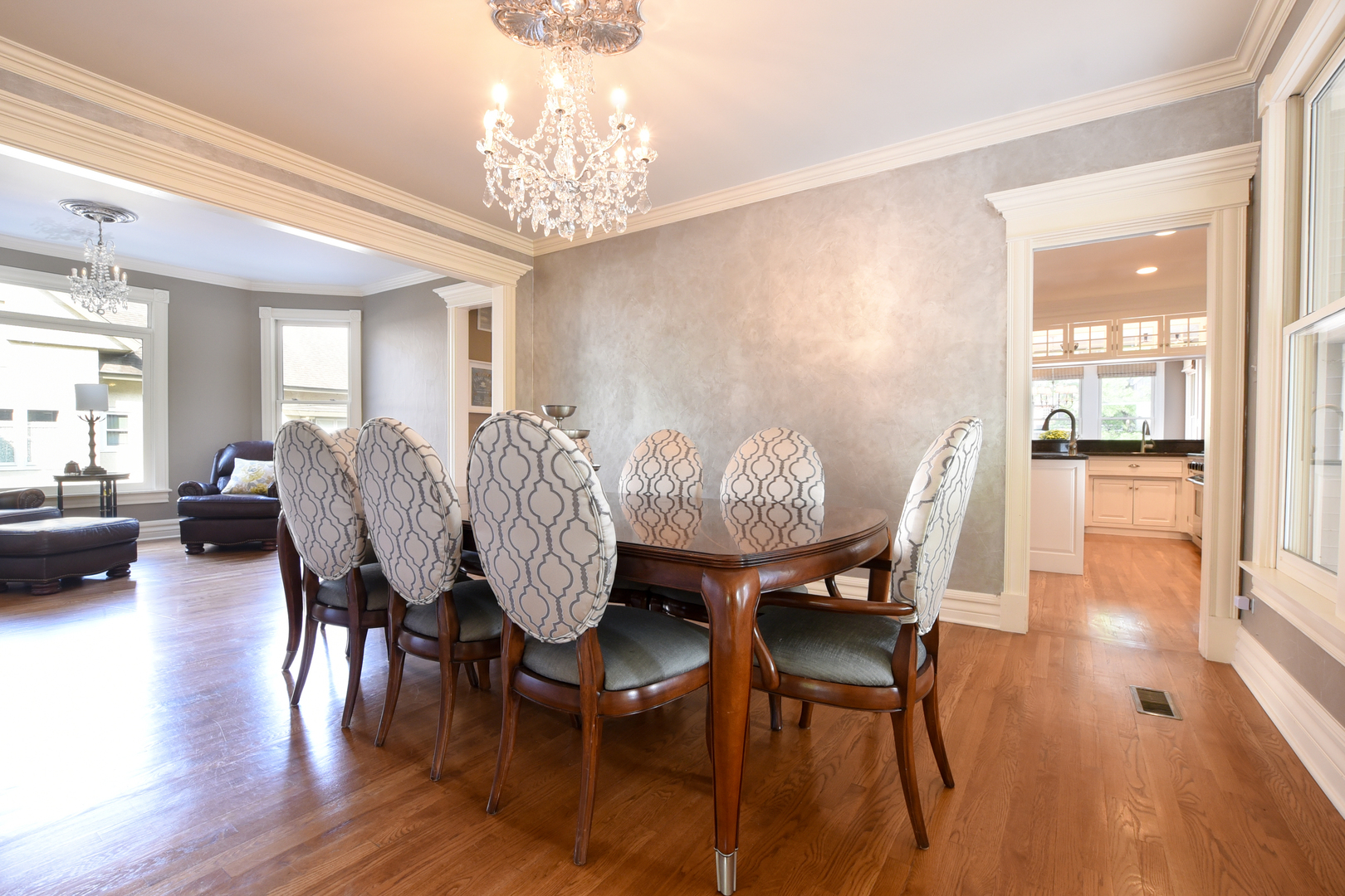 300 North Delaplaine Road Riverside, IL 60546 - Photo 8 of 50 a view of a dining room with furniture wooden floor and chandelier