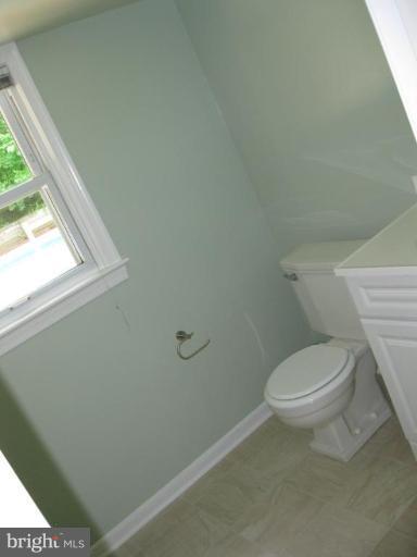 8209 Beech Tree Road Bethesda, MD 20817 - Photo 7 of 20 Half Bath 1 on entrance level.