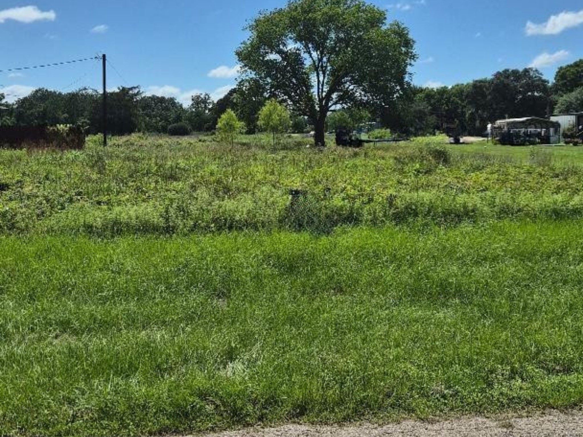 Nice City Lot that faces a spacious private ranch.