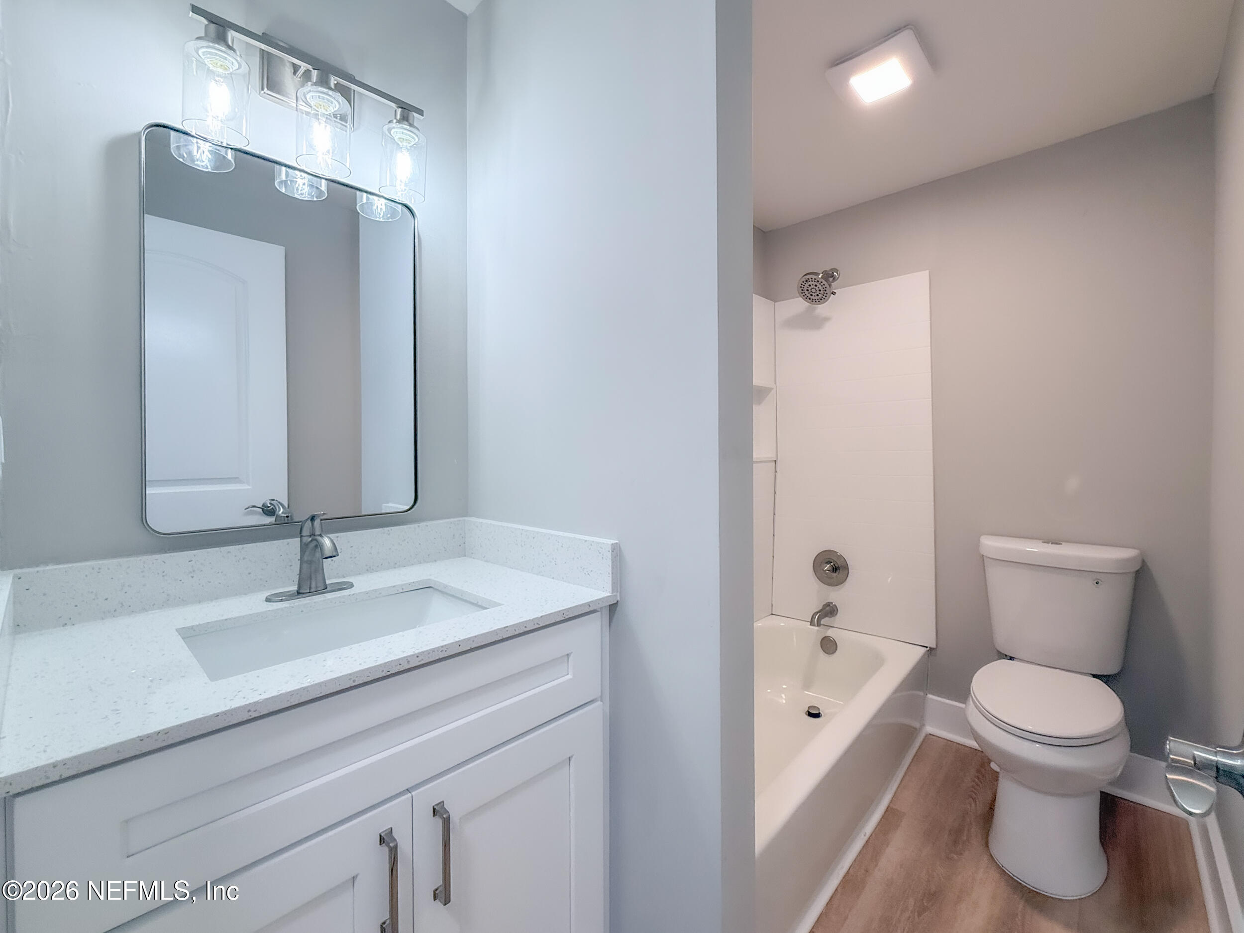 6304 Blanchard Road Jacksonville, FL 32216 - Photo 14 of 15 a bathroom with a sink a toilet and shower