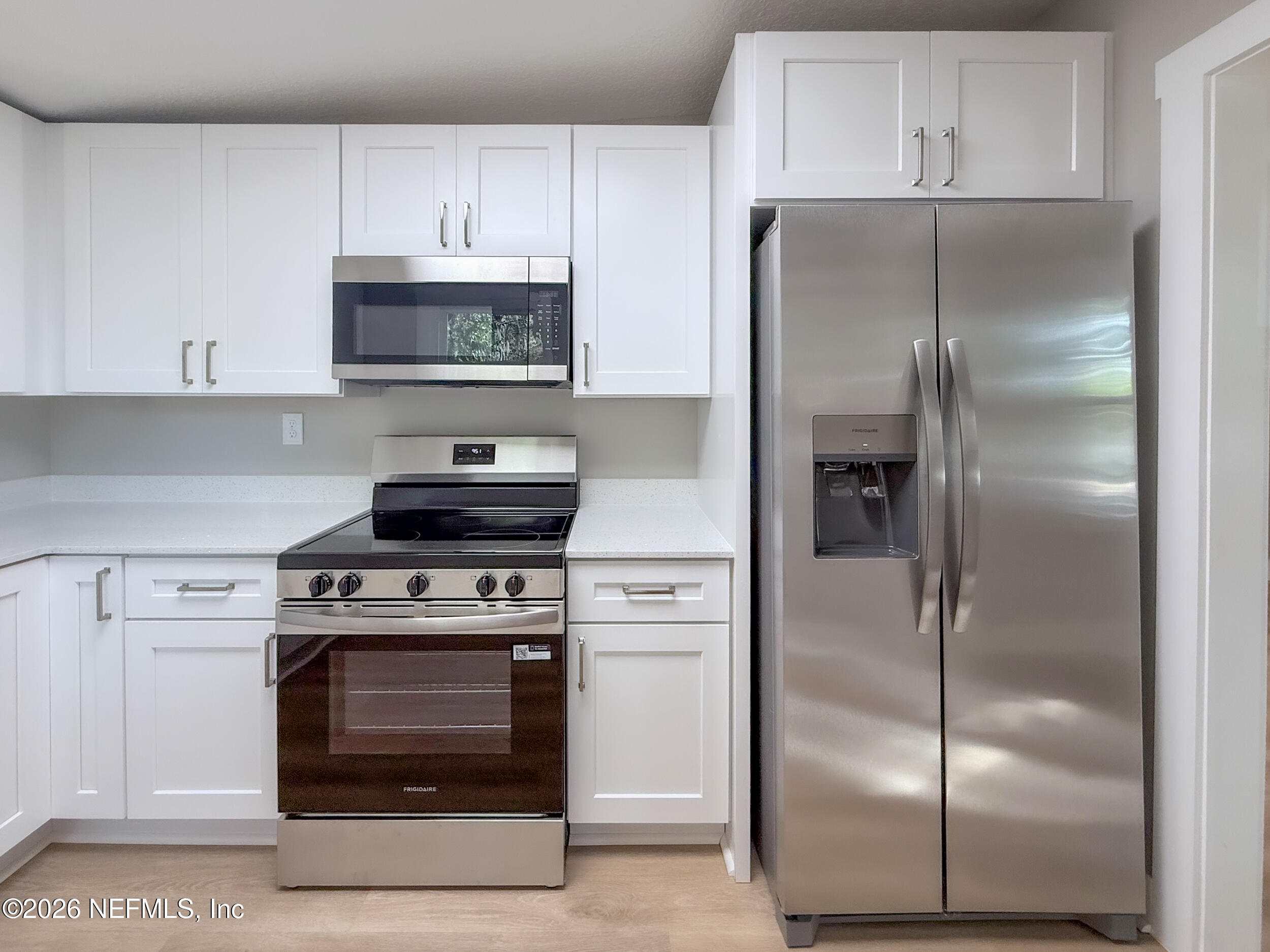 6304 Blanchard Road Jacksonville, FL 32216 - Photo 9 of 15 a kitchen with cabinets and stainless steel appliances