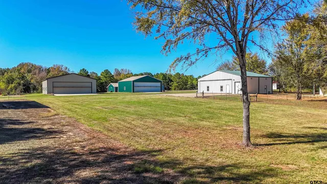 a view of a street with an house