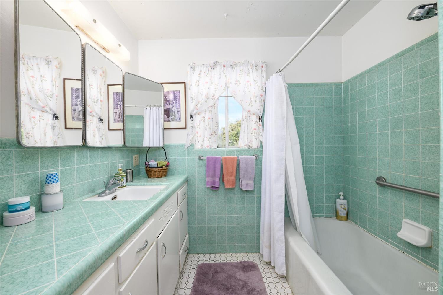 5430 Putah Creek Road Winters, CA 95694 - Photo 18 of 99 a bathroom with a granite countertop sink a toilet and shower