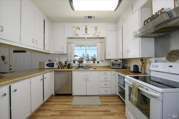 a view of a floor to ceiling window and an ocean view