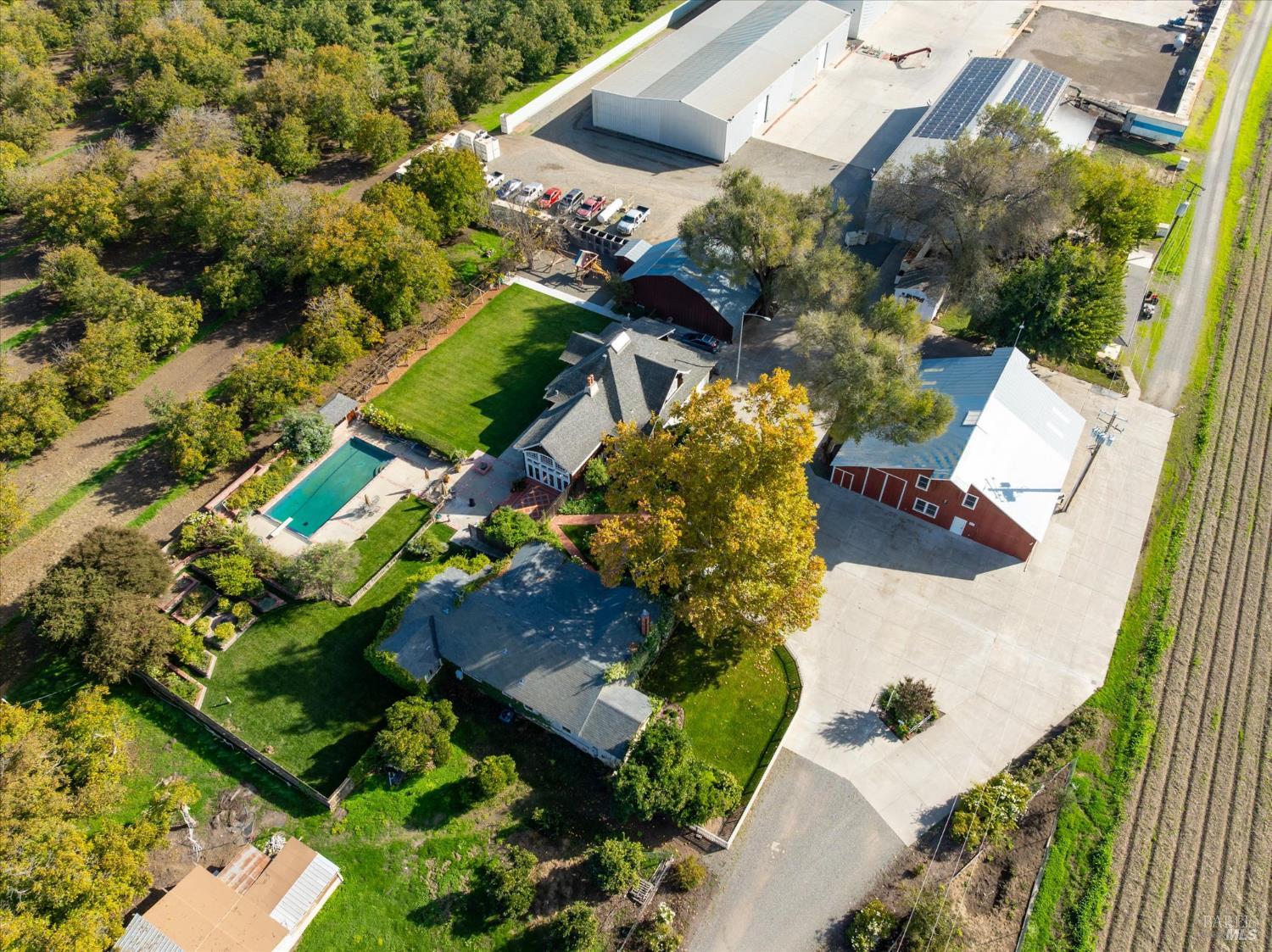 5430 Putah Creek Road Winters, CA 95694 - Photo 5 of 99 an aerial view of a house with a yard and swimming pool