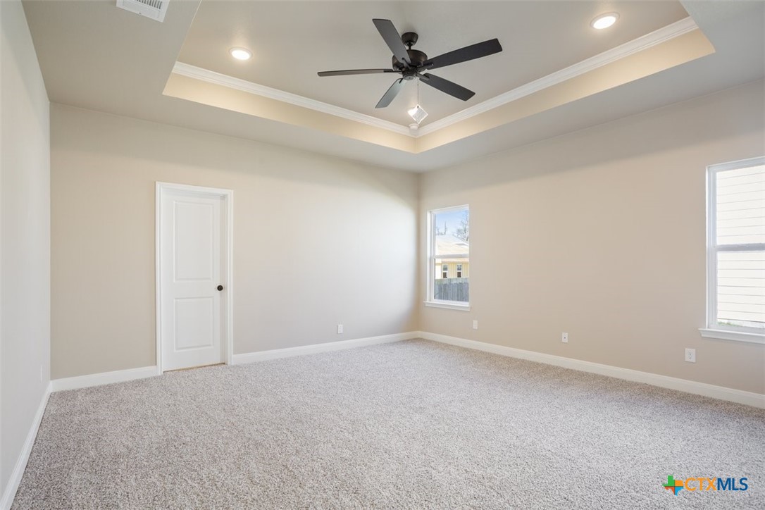 3824 Keller Road Temple, TX 76504 - Photo 15 of 28 an empty room with a window and a fan