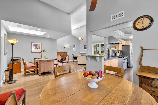 a living room with furniture and a table