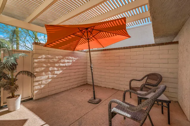 a backyard of a house with seating space