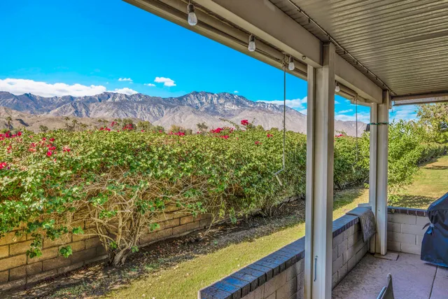 a view of a balcony with an outdoor space