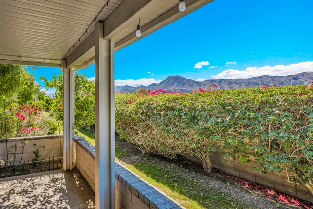 a view of a balcony with an outdoor space