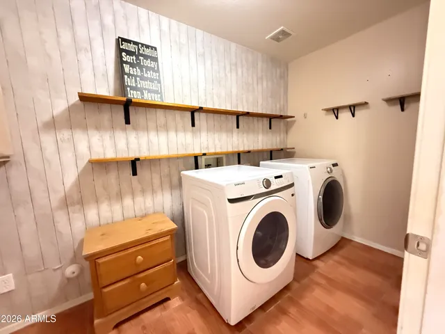 a view of a hallway with windows