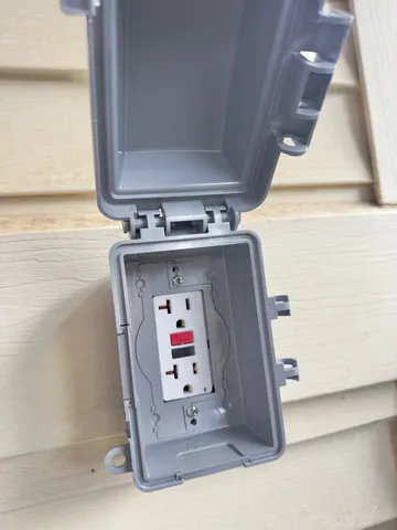 a view of a road with trees in the background