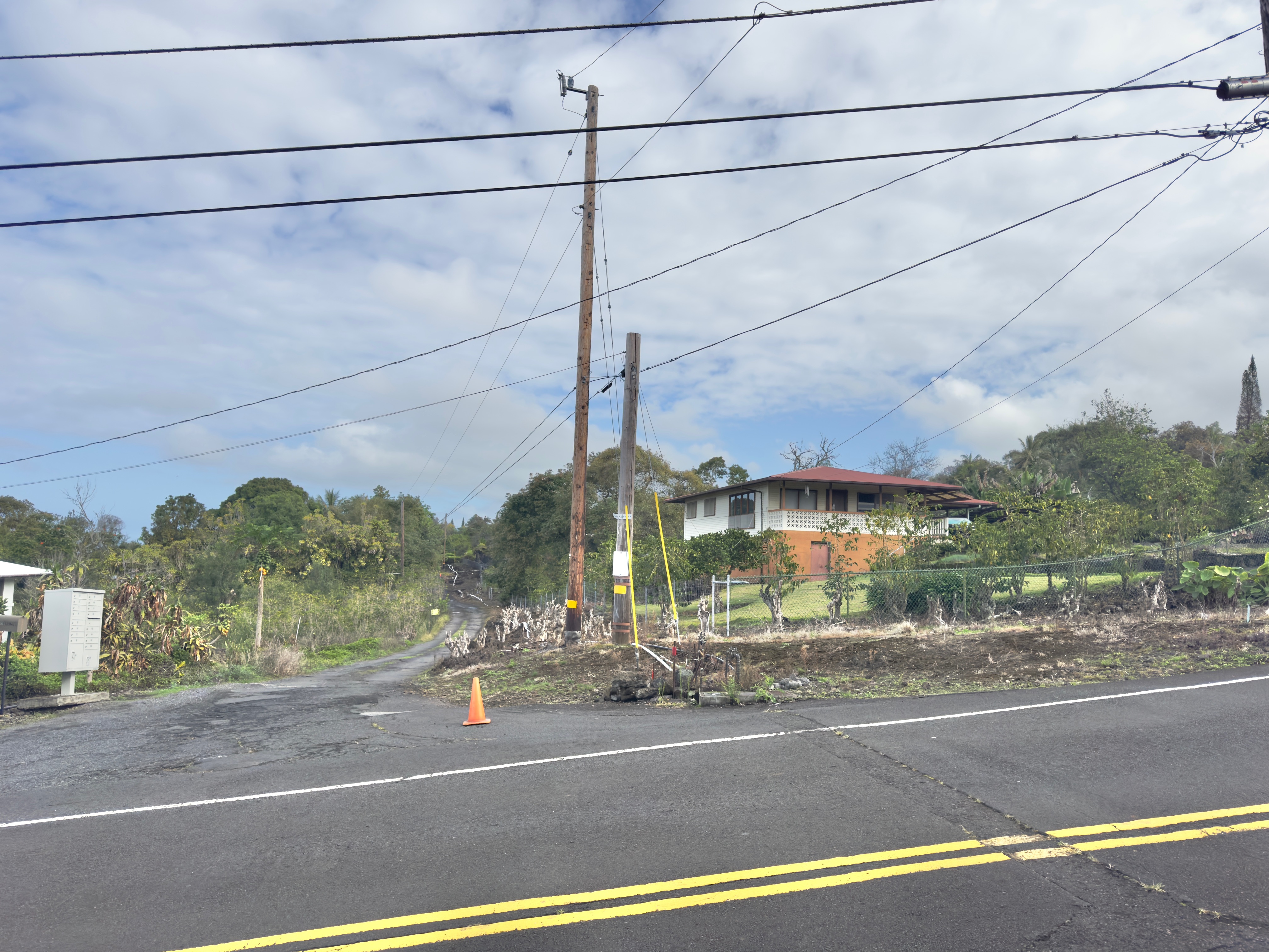 82-1091 Kinue Road Captain Cook, HI 96704 - Photo 23 of 28 a outdoor view of a building with a street