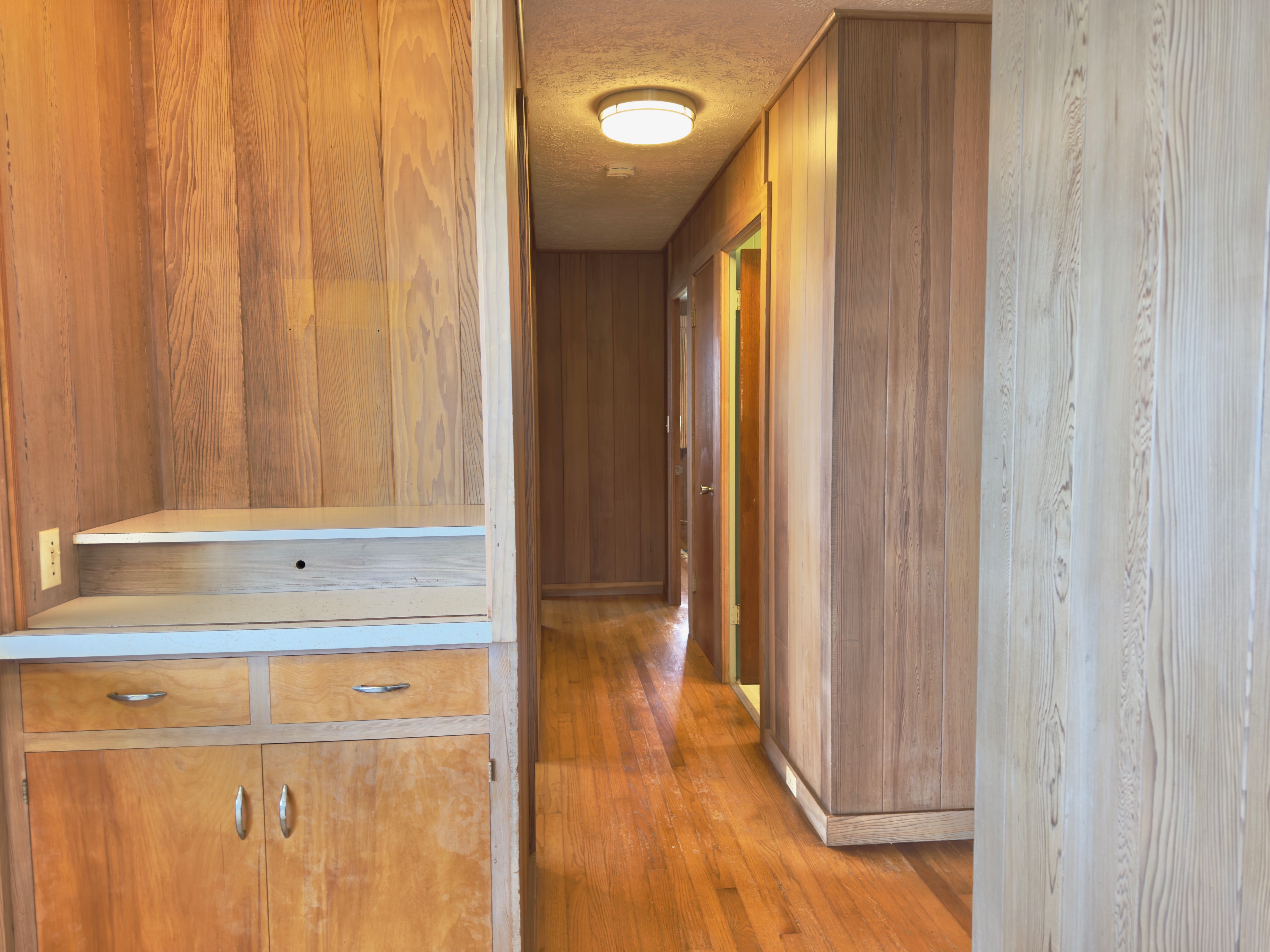 82-1091 Kinue Road Captain Cook, HI 96704 - Photo 8 of 28 a view of a hallway with wooden floor