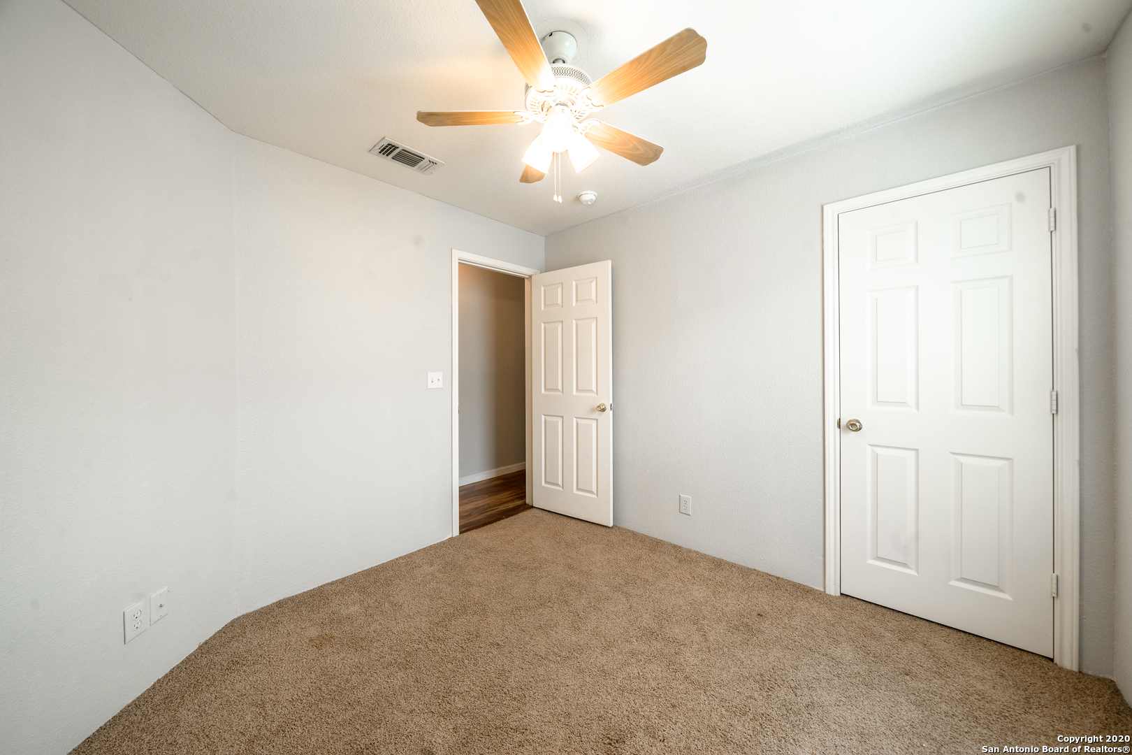 7907 M G Road San Antonio, TX 78251 - Photo 13 of 19 an empty room with fan and a ceiling fan