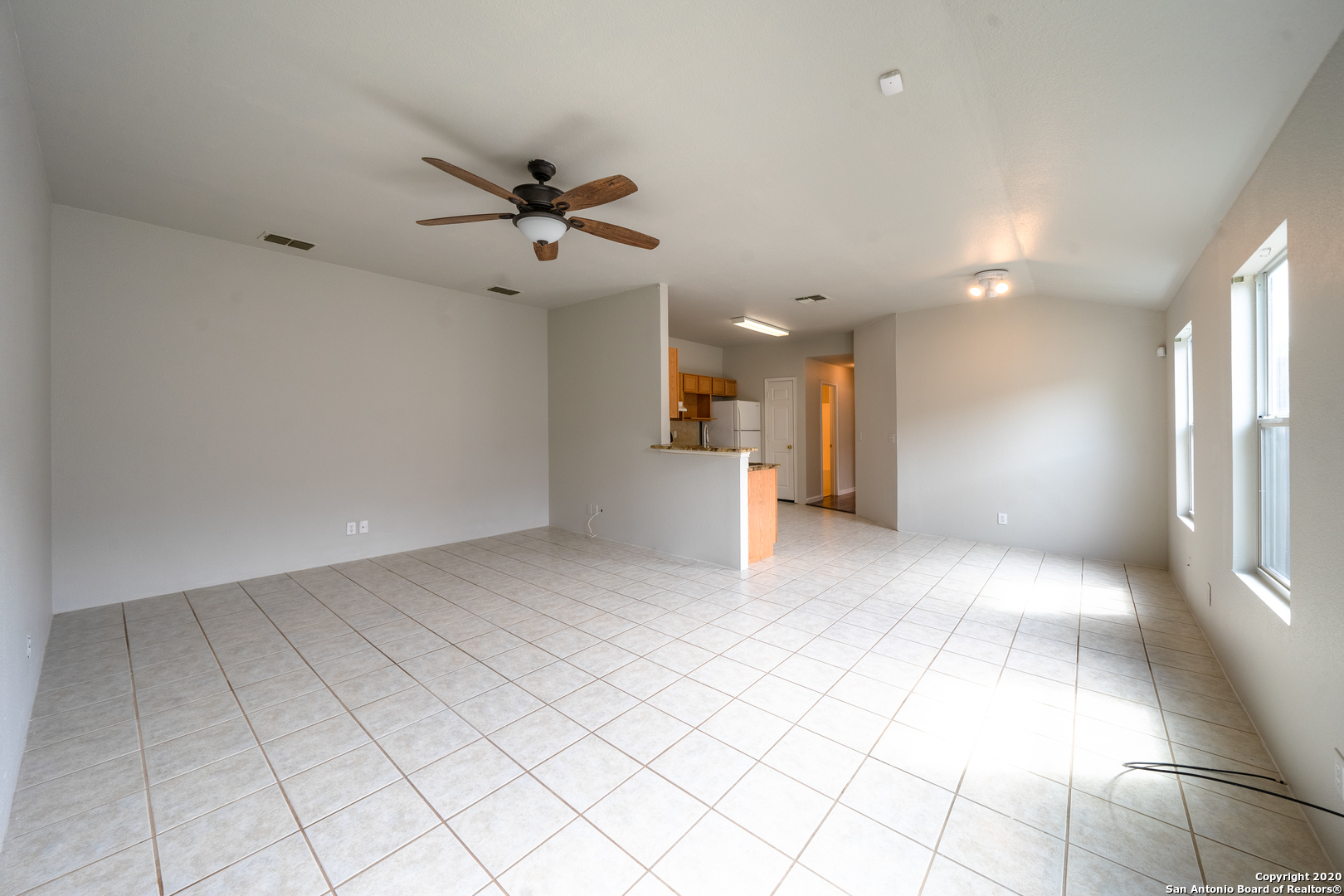 7907 M G Road San Antonio, TX 78251 - Photo 3 of 19 a view of an empty room and a window