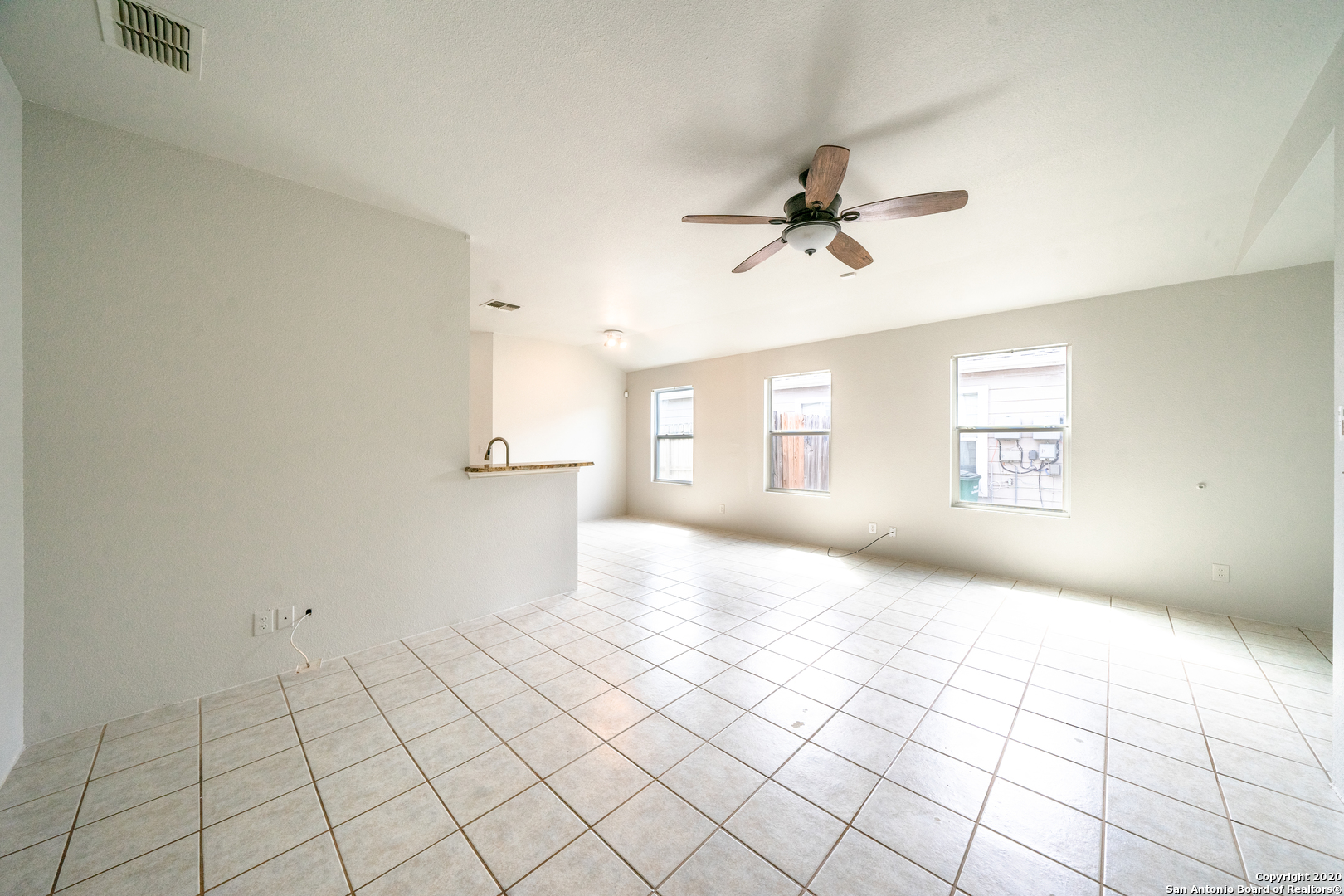7907 M G Road San Antonio, TX 78251 - Photo 4 of 19 a view of an empty room and window