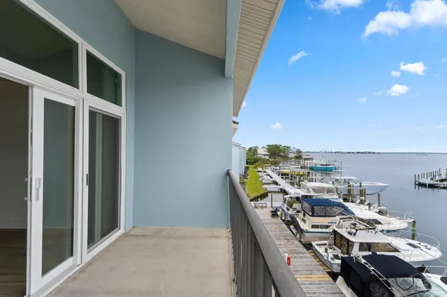 a view of a balcony with chairs
