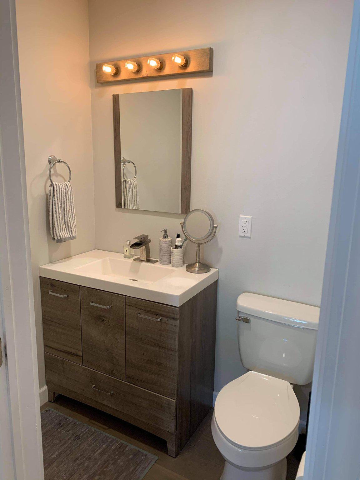 329 Clemens Road Harleysville, PA 19438 - Photo 5 of 19 Modern powder room with sleek finishes.