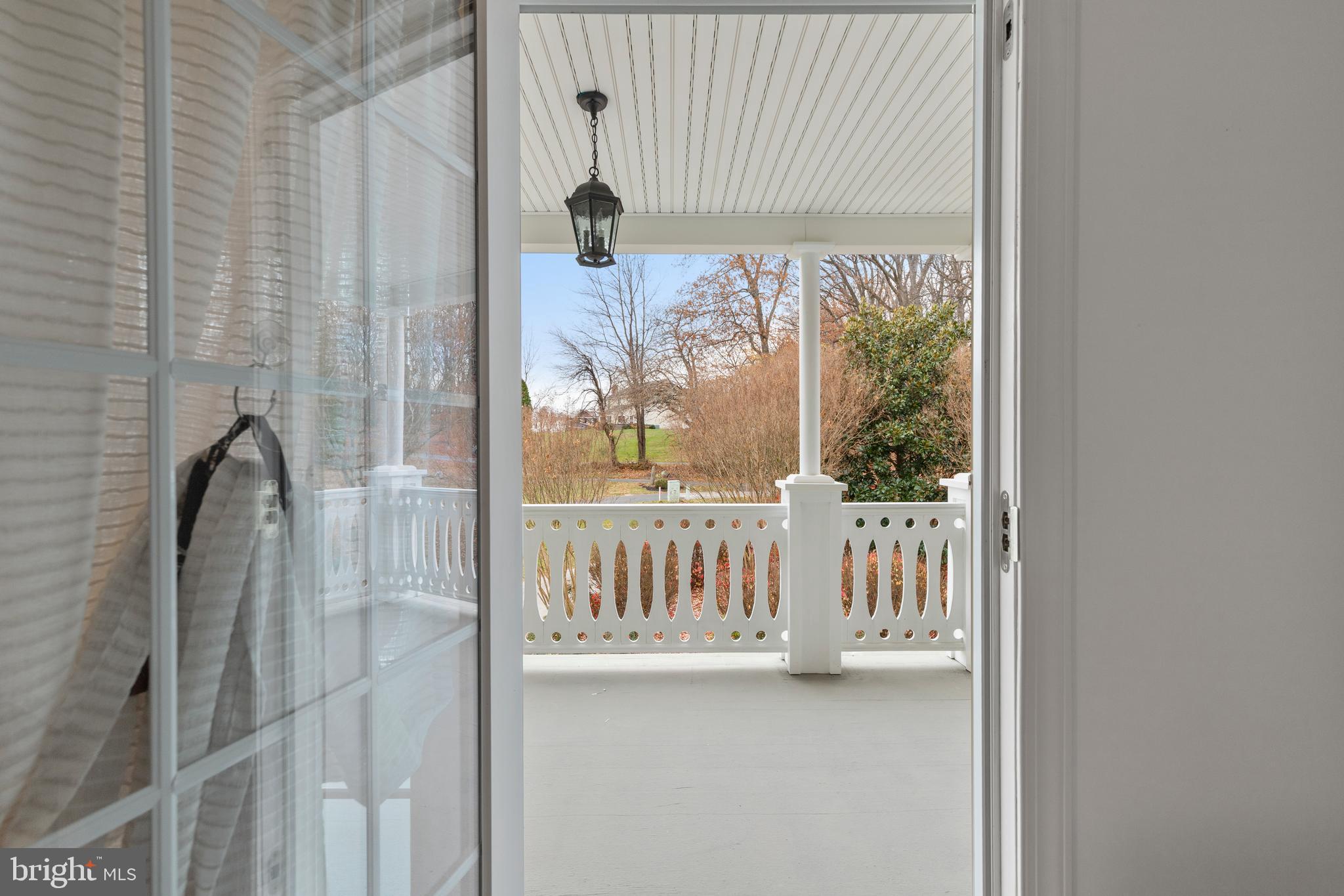 2183 Amoss Mill Road Pylesville, MD 21132 - Photo 13 of 90 Interior front porch view at upper level