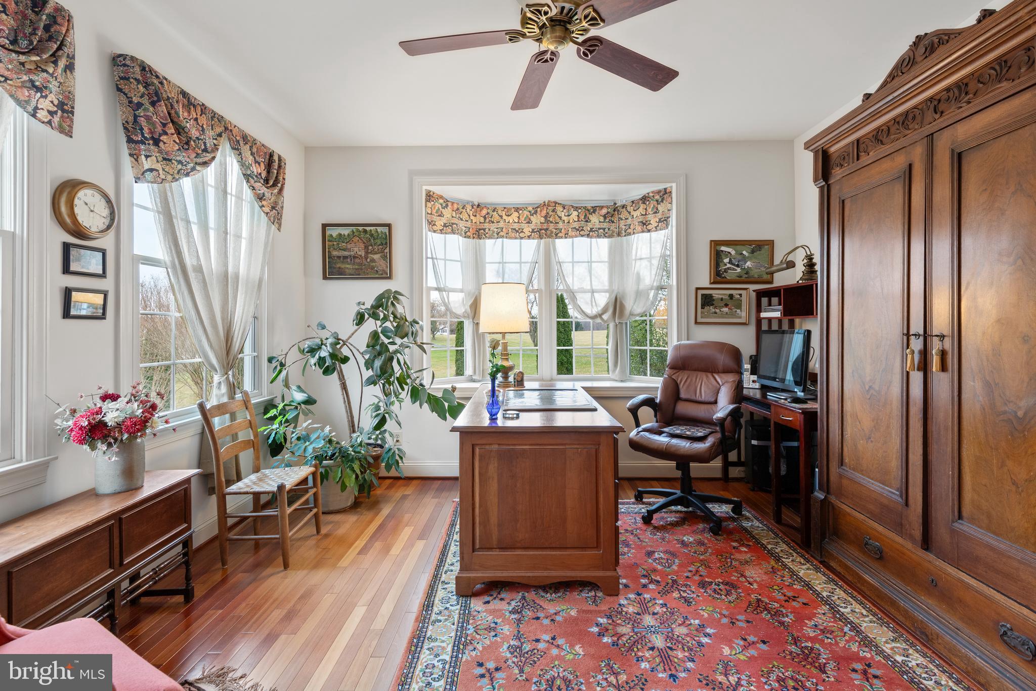 2183 Amoss Mill Road Pylesville, MD 21132 - Photo 22 of 90 a view of a workspace with furniture and a window