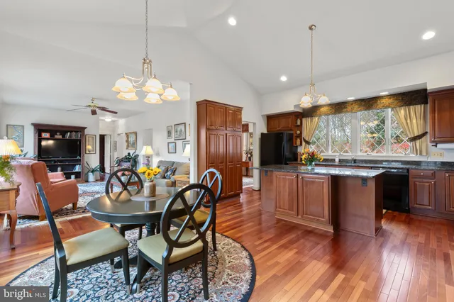 a bathroom with a bathtub a sink and a mirror