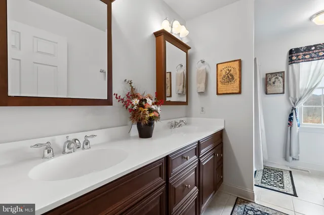 a front view of a house with table and chairs