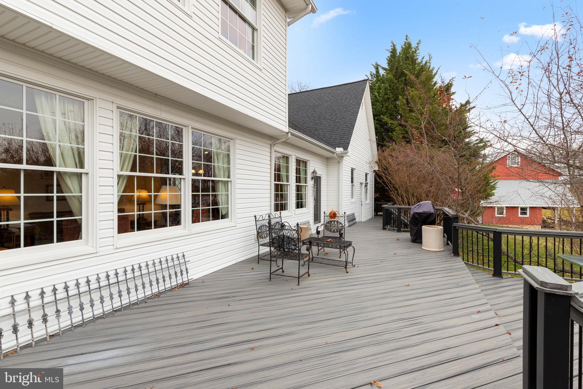 2183 Amoss Mill Road Pylesville, MD 21132 - Photo 55 of 90 Deck extends to rear exterior garage entrance
