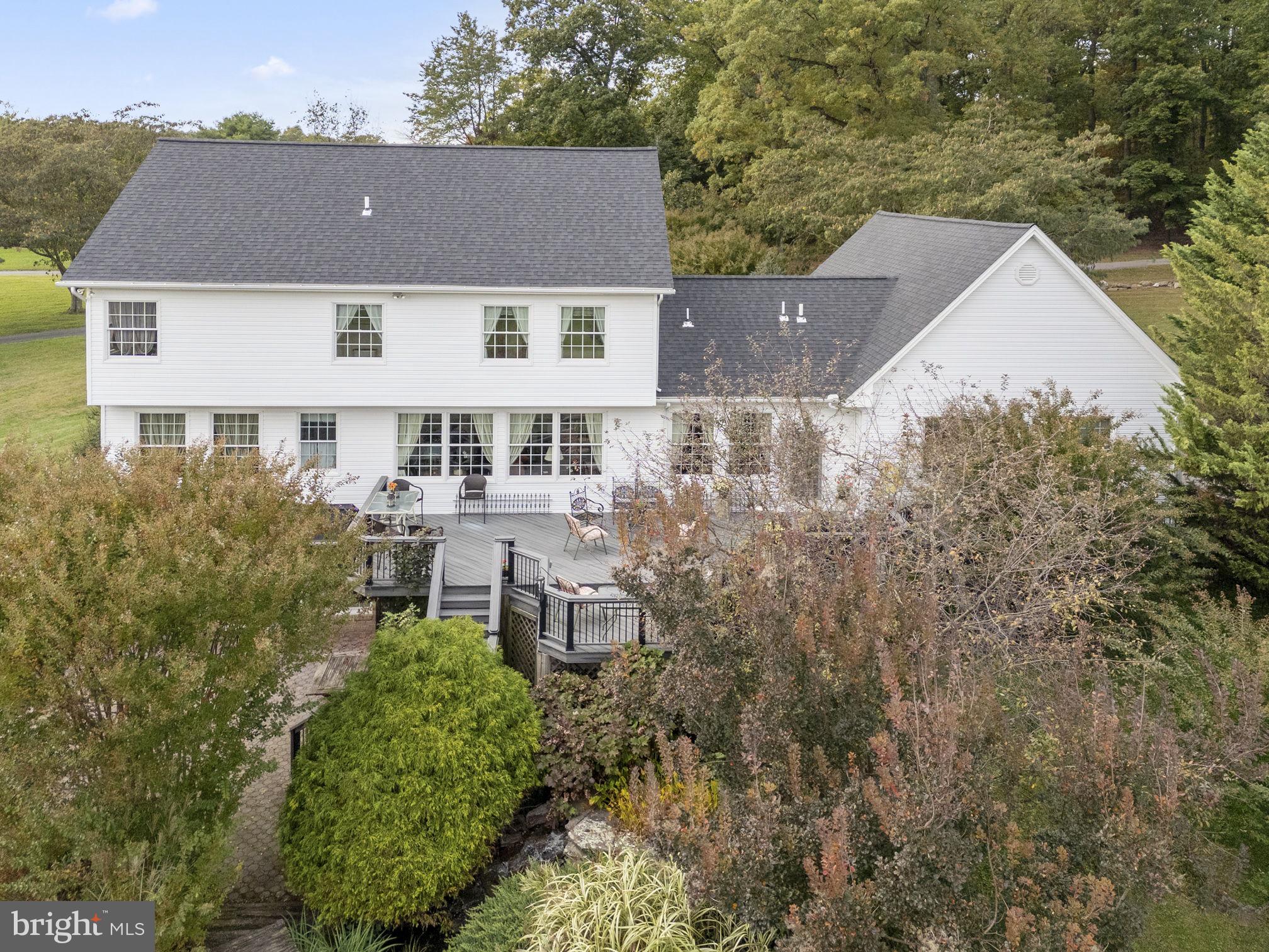 2183 Amoss Mill Road Pylesville, MD 21132 - Photo 60 of 90 Rear view of house, garage, deck & landscaping