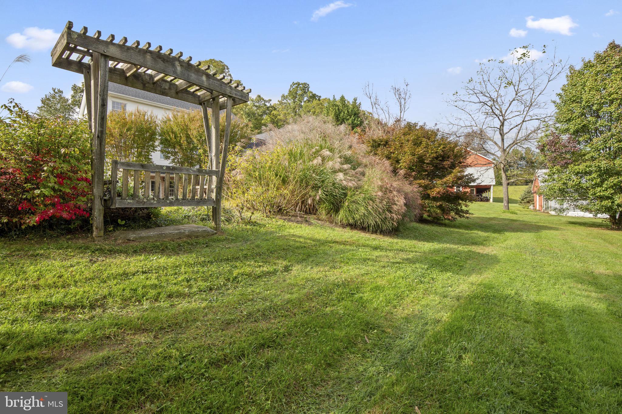 2183 Amoss Mill Road Pylesville, MD 21132 - Photo 68 of 90 a view of a garden with large trees