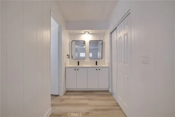 a view of a bathroom from the hallway