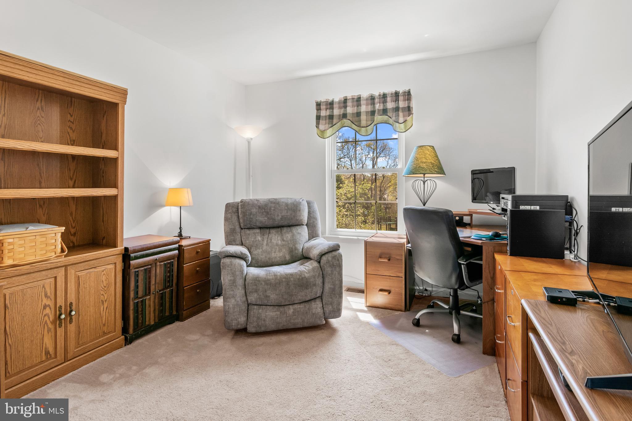 7866 Kings Bench Place Pasadena, MD 21122 - Photo 37 of 51 a workspace with furniture and a window