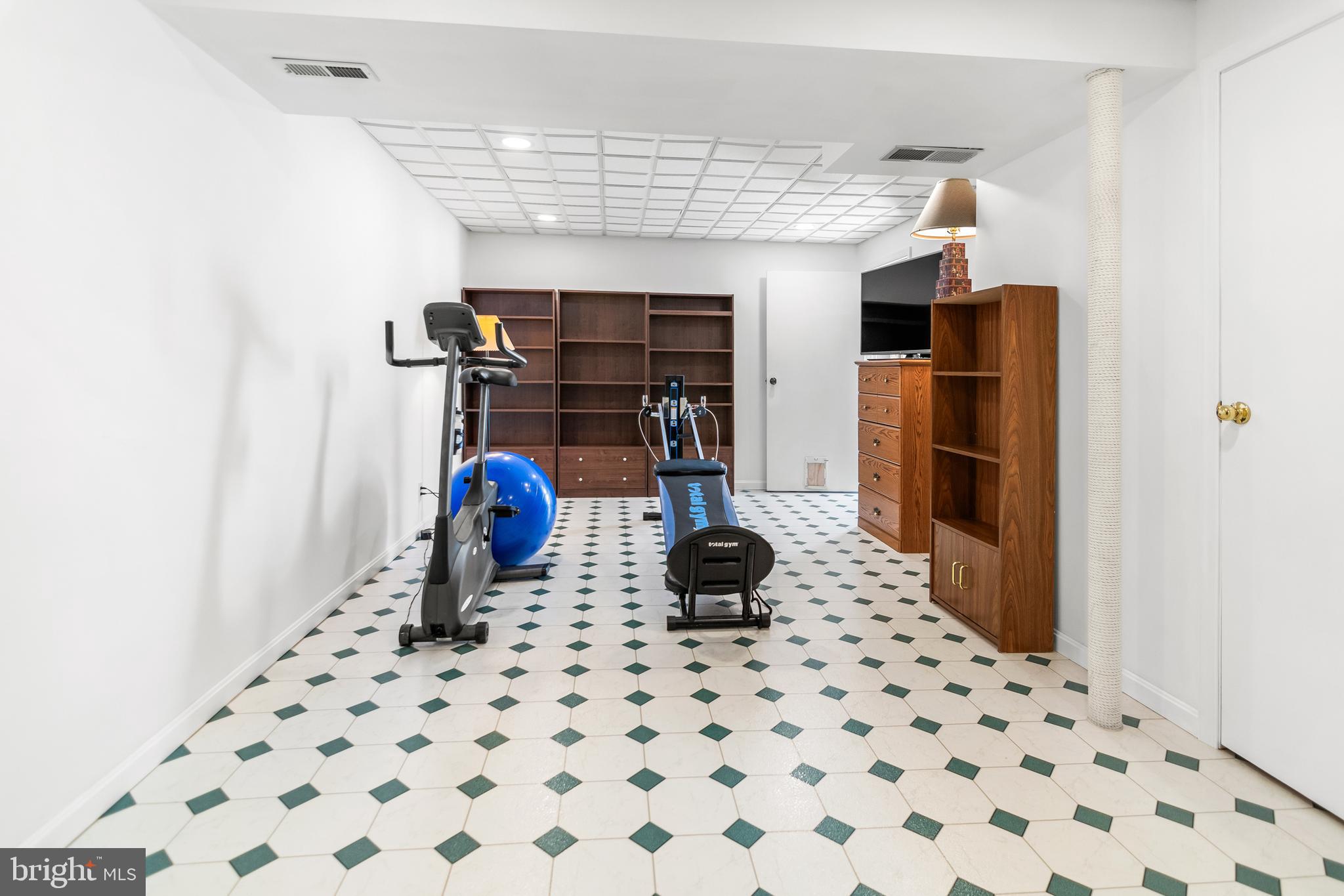 7866 Kings Bench Place Pasadena, MD 21122 - Photo 39 of 51 a room with musical instruments