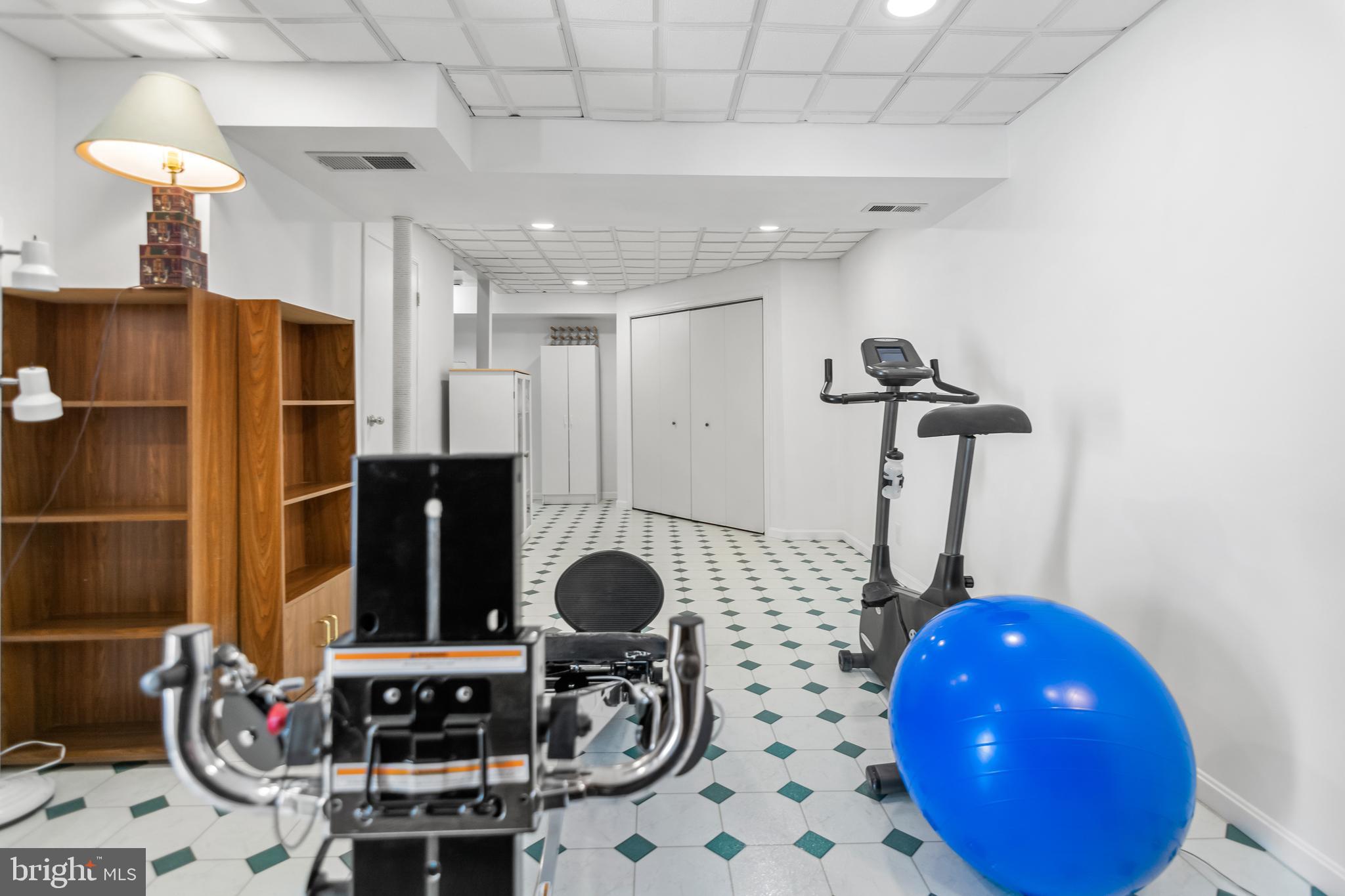 7866 Kings Bench Place Pasadena, MD 21122 - Photo 40 of 51 a bathroom with a sink and a mirror