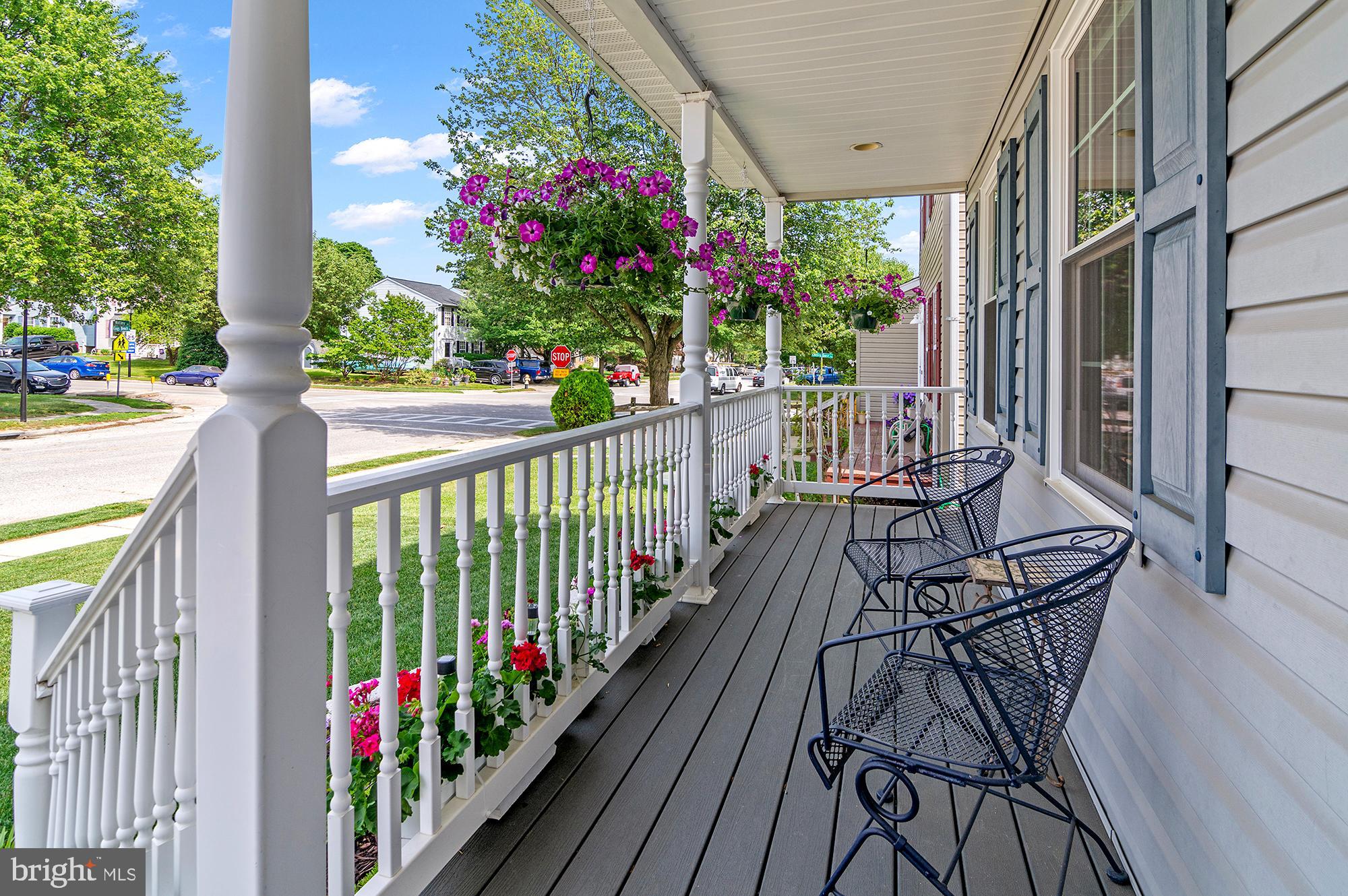 7866 Kings Bench Place Pasadena, MD 21122 - Photo 5 of 51 a view of a balcony with flower pots