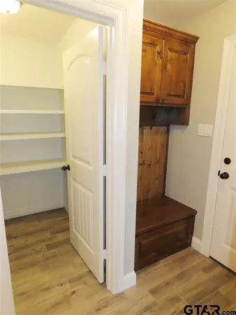 a view of a bathroom from a hallway