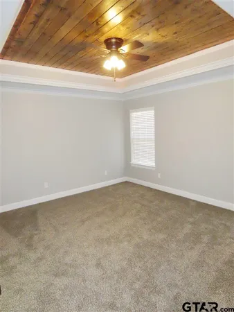 a view of bathroom with a sink and mirror