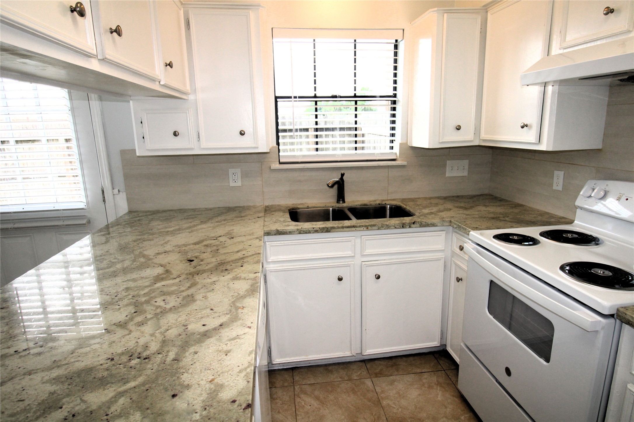 1101 Wilson Drive Rosenberg, TX 77471 - Photo 13 of 38 NEW ELECTRIC STOVE & DISHWASHER! UPDATED UNDERMOUNT SINK & FIXTURE!