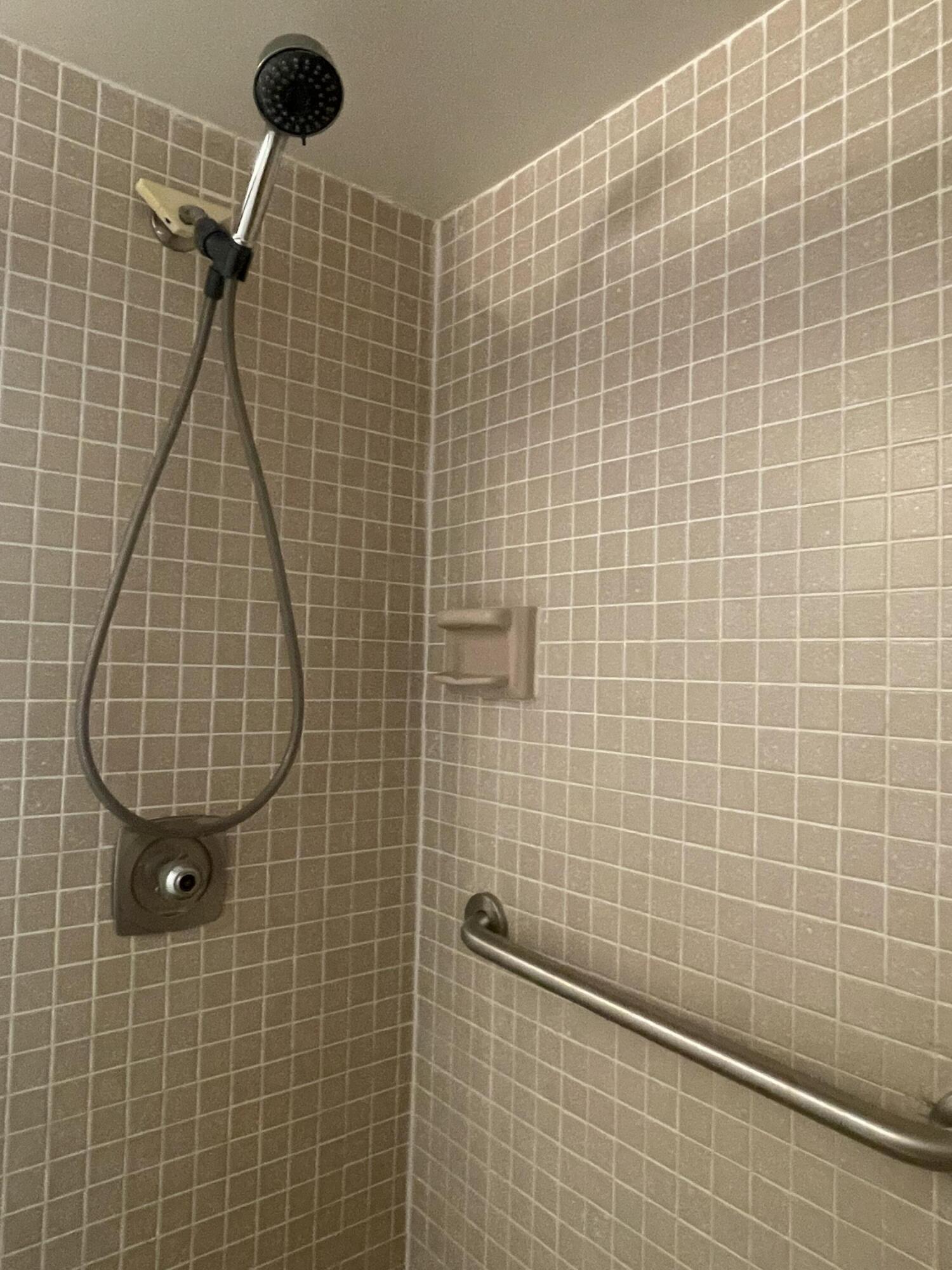 83 Capri B, Unit B Delray Beach, FL 33484 - Photo 18 of 26 a bathroom with a shower