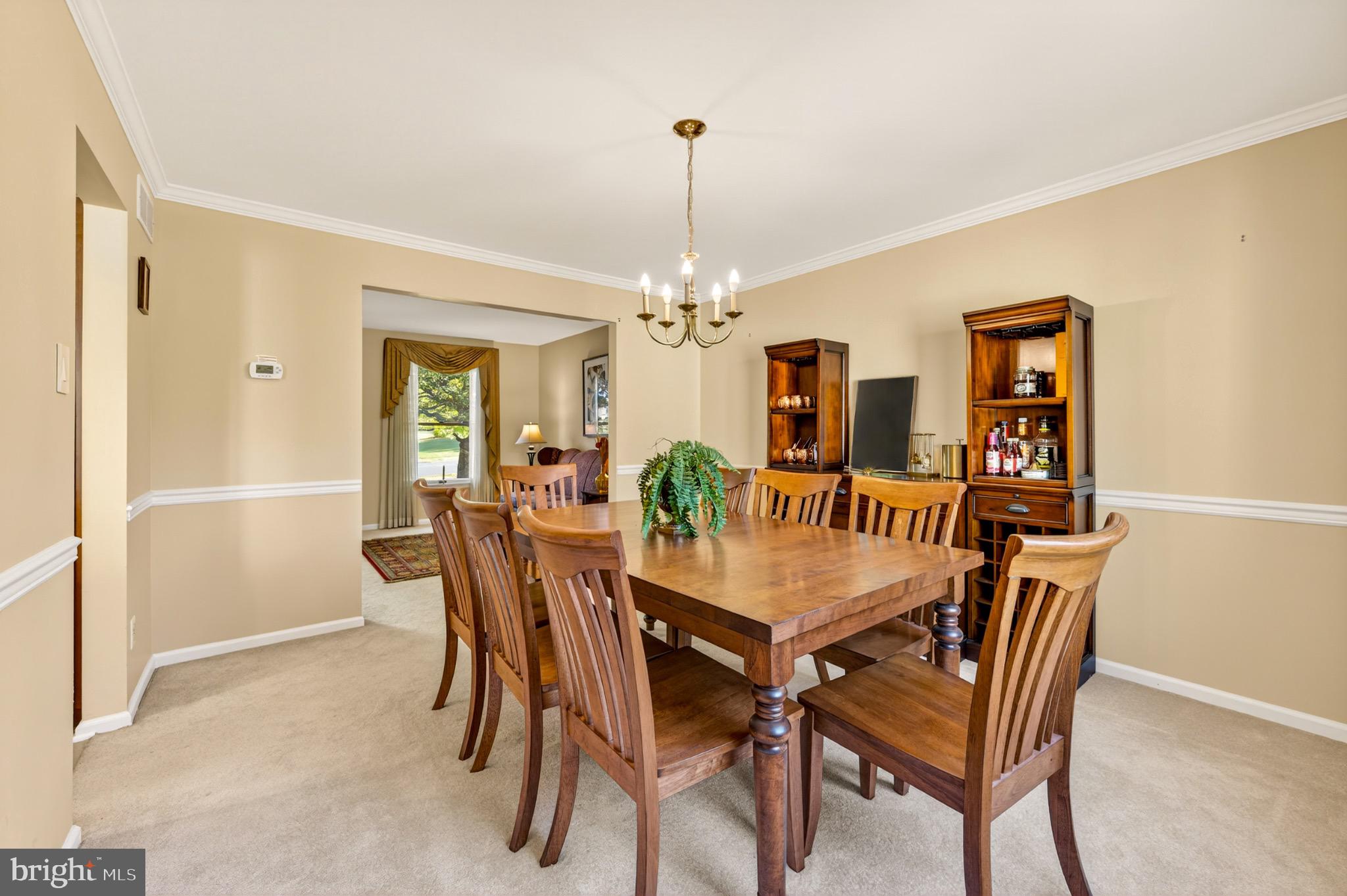 1520 Fairgrounds Road Hatfield, PA 19440 - Photo 14 of 52 a dining room with furniture a chandelier and wooden floor