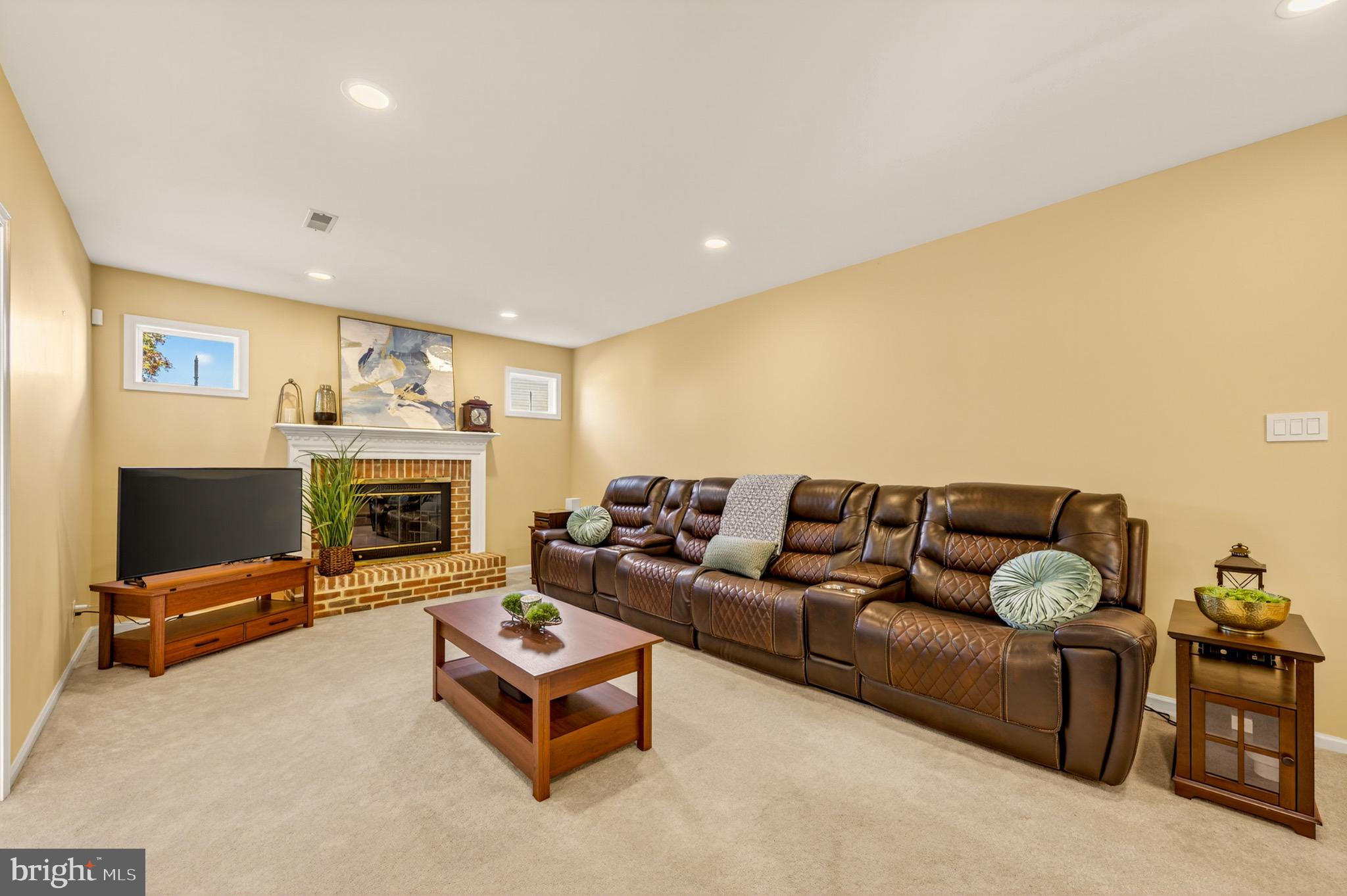 1520 Fairgrounds Road Hatfield, PA 19440 - Photo 21 of 52 a living room with fireplace furniture and a flat screen tv
