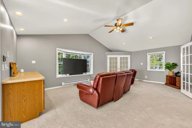 a living room with furniture and a couch