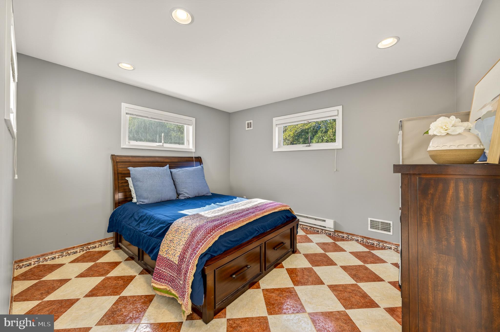1520 Fairgrounds Road Hatfield, PA 19440 - Photo 27 of 52 a bedroom with a bed and wooden floor