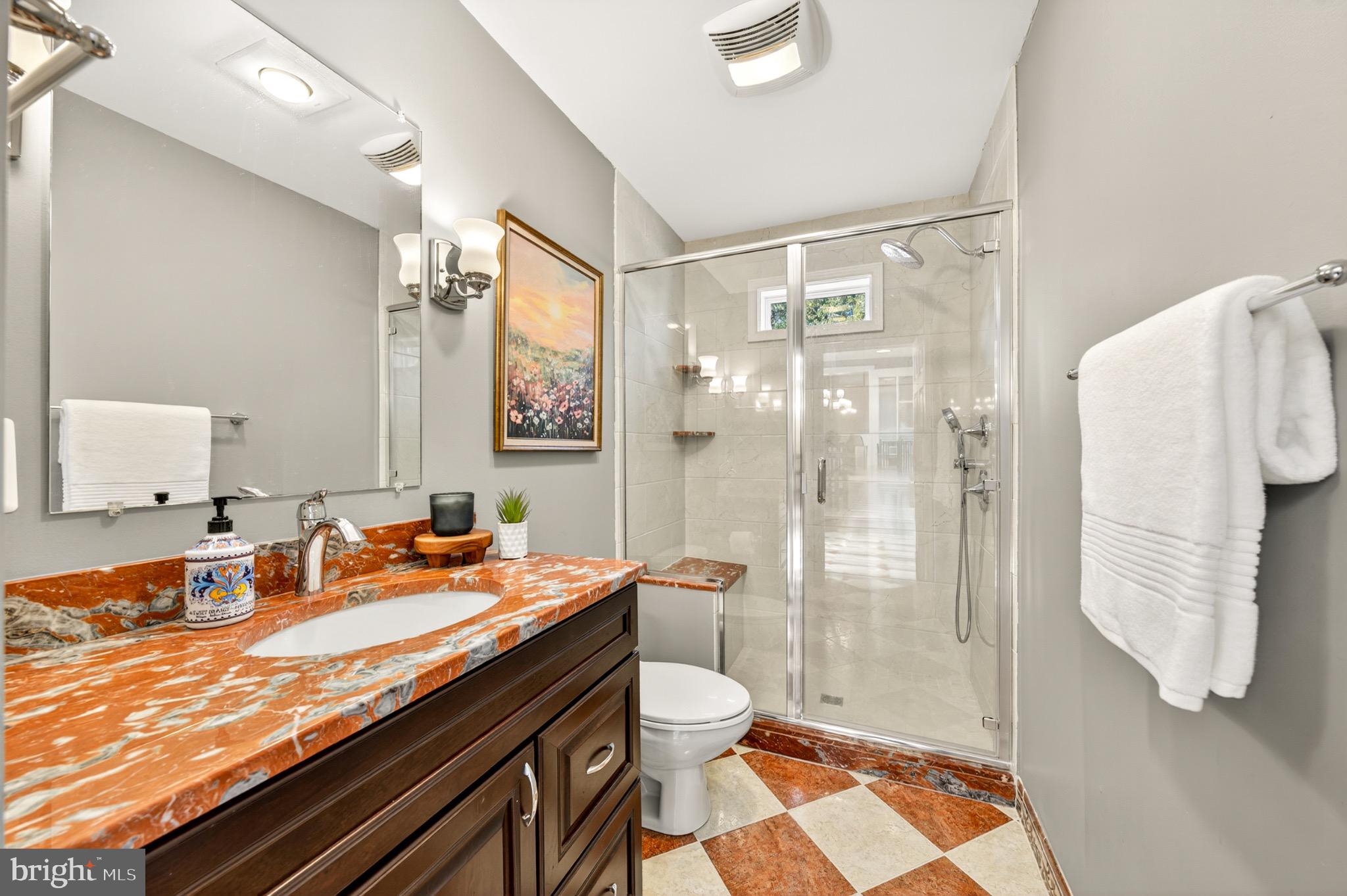 1520 Fairgrounds Road Hatfield, PA 19440 - Photo 28 of 52 a bathroom with a granite countertop sink toilet and shower