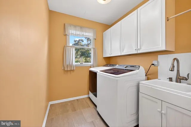 a work room with furniture and a window