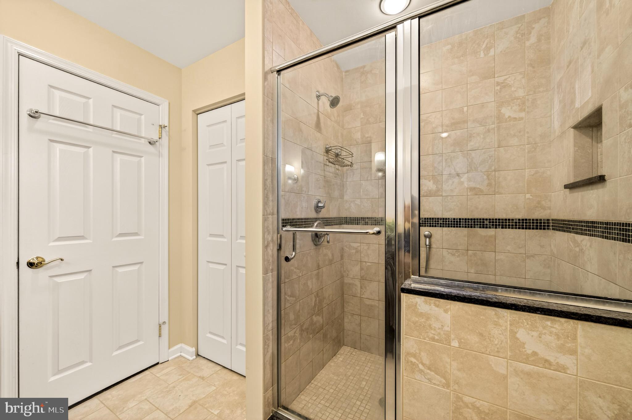 1520 Fairgrounds Road Hatfield, PA 19440 - Photo 40 of 52 a bathroom with a shower and a glass door